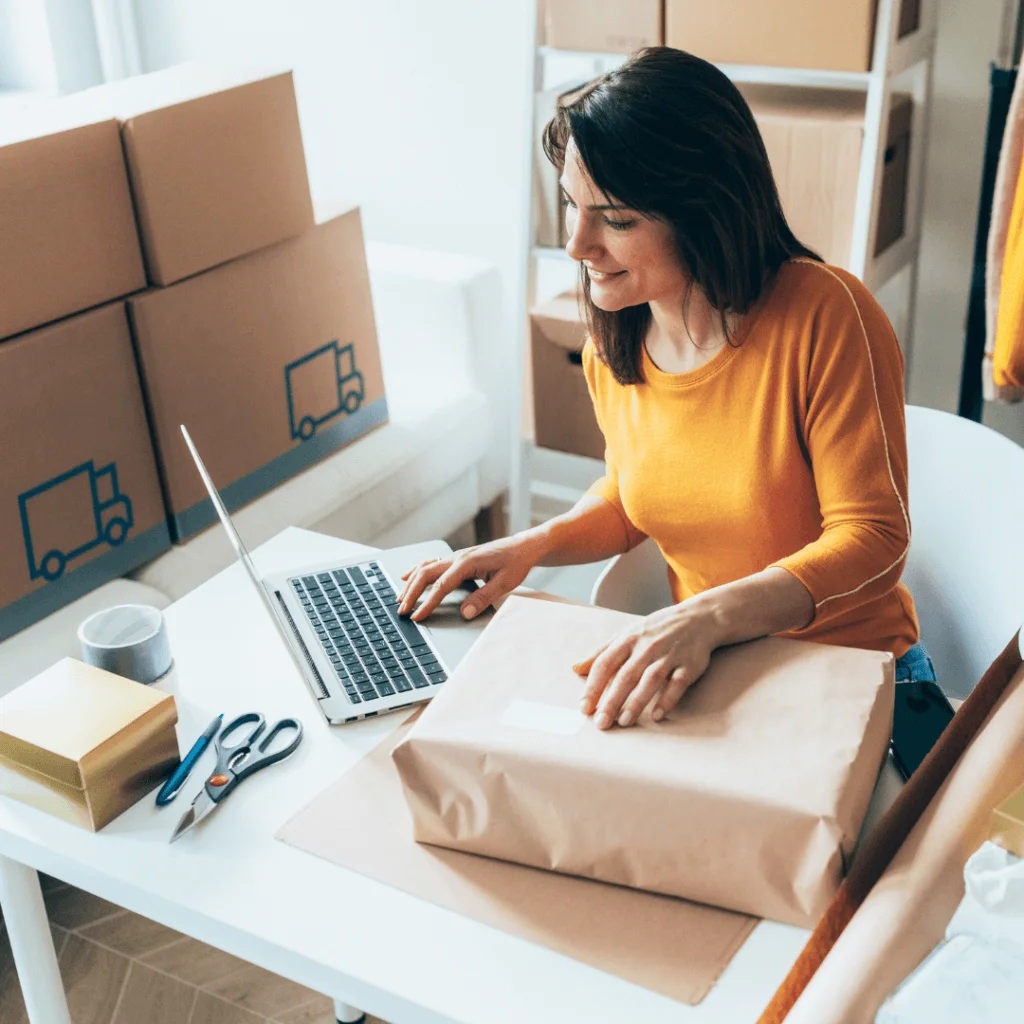A picture of a small business owner looking at her website.