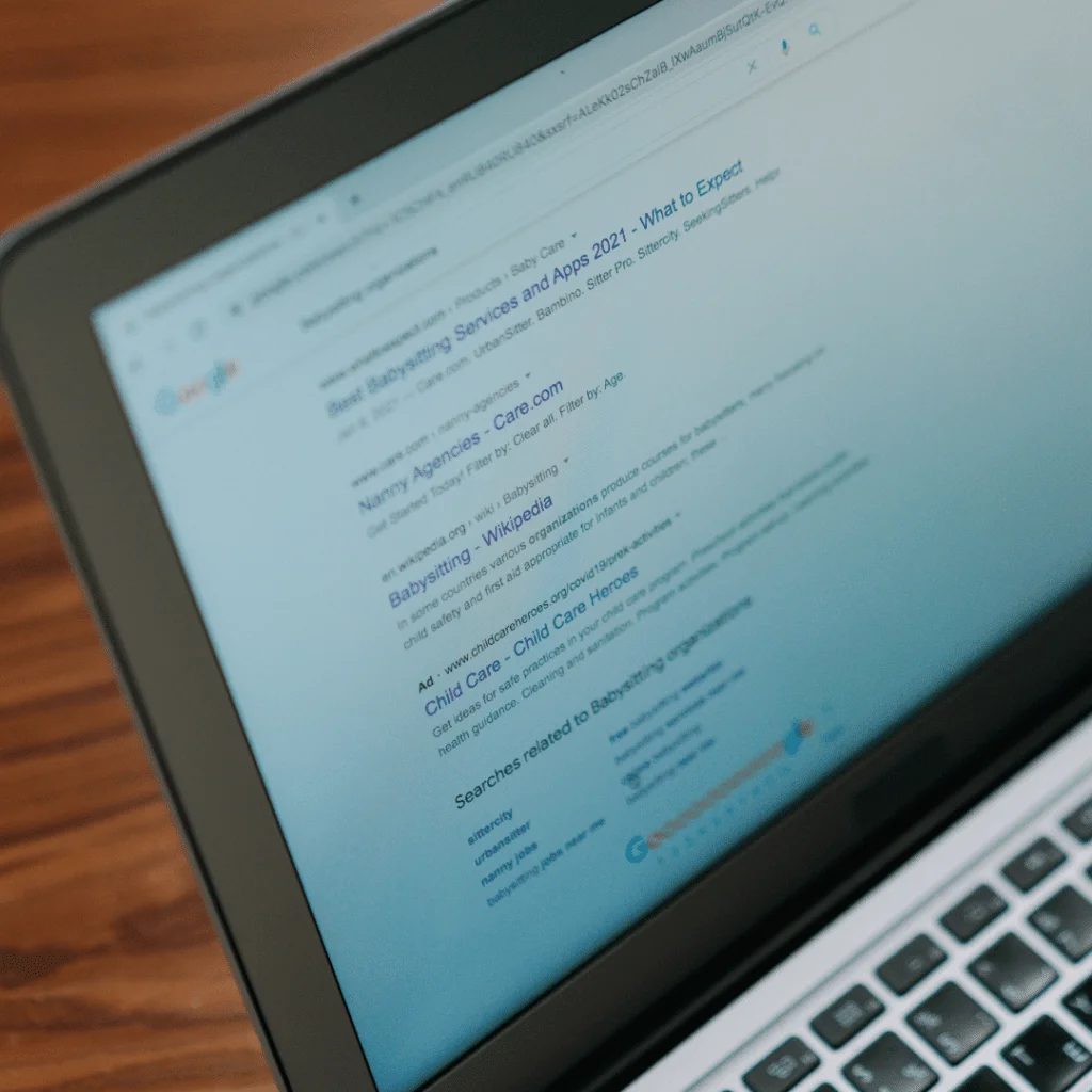 a closeup of a Google search results screen on a laptop